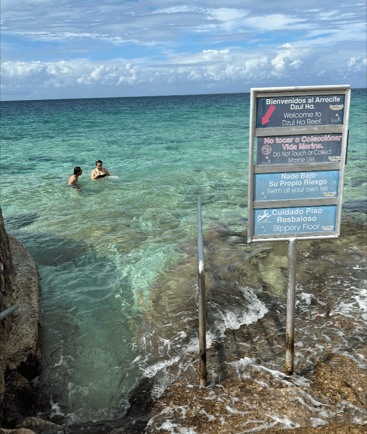 Cozumel beach clubs – Jet Ski Cozumel Ocean entrance and water with people swimmjng