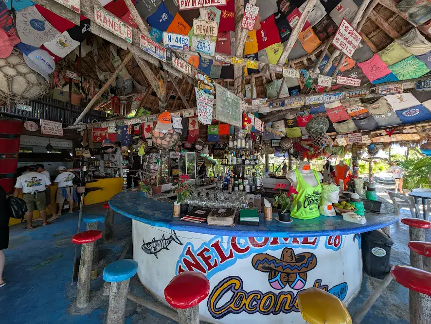 Cozumel public beaches – Jet Ski Cozumel Inside cozumel's coconuts bar