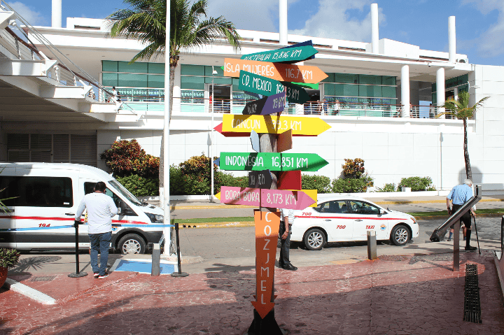 What not to do in Cozumel taxis parked on the road outside the port