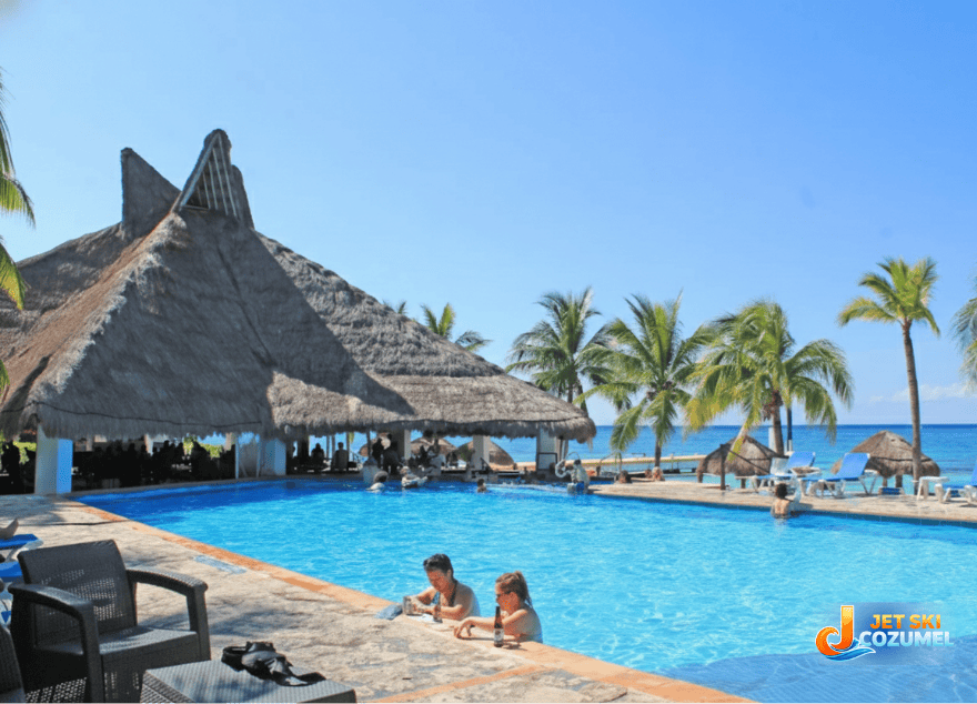best-beach-club-in-cozumel-for-adults – Jet Ski Cozumel Best beach club in Cozumel for adults showing nachi Cocum pool with two women in it