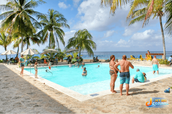 cozumel-beach-club-buccanos – Jet Ski Cozumel Cozumel beach club buccanos pool with people swimming and standing