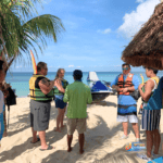 cozumel-jet-ski – Jet Ski Cozumel A family of five listening to a instructor explain a Cozumel jet ski rental rules