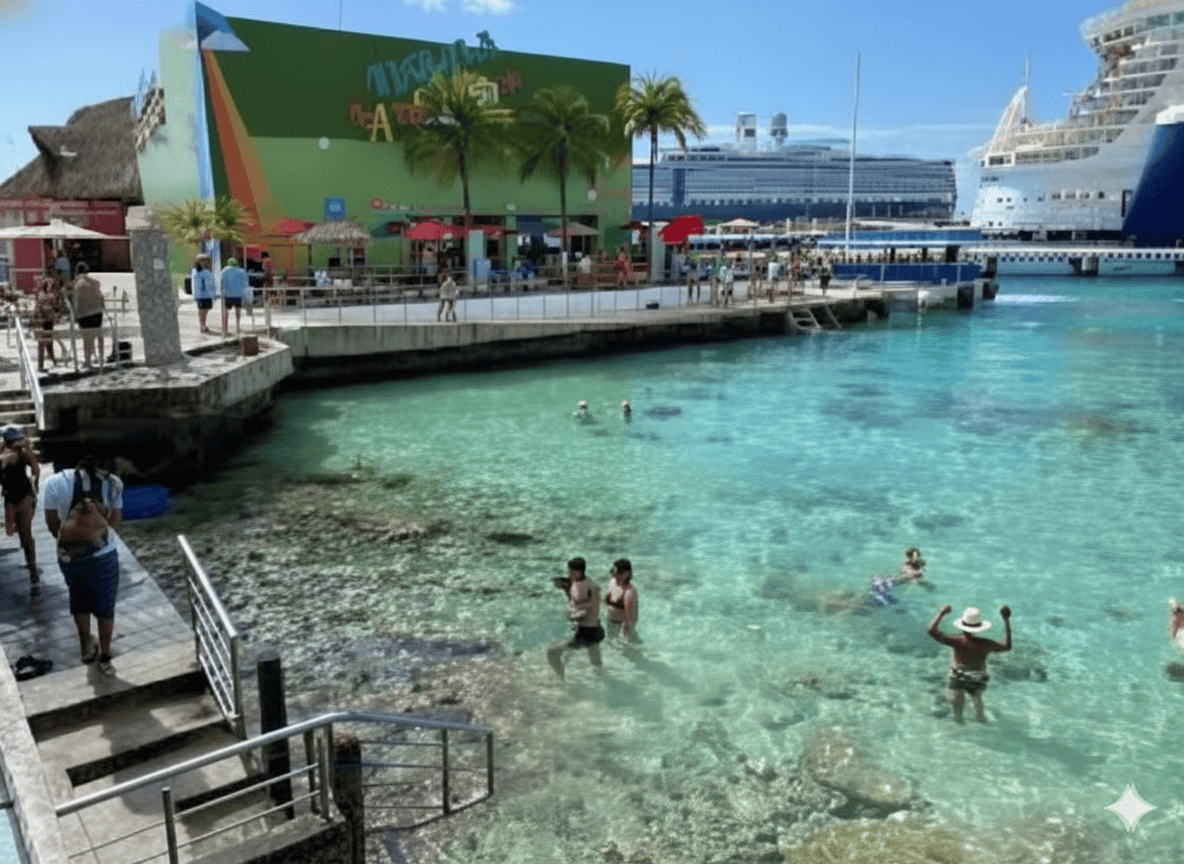 What to do in Cozumel cruise port showing 3 travelers in the water swimming at the dedicated area inside Cozumels cruise port