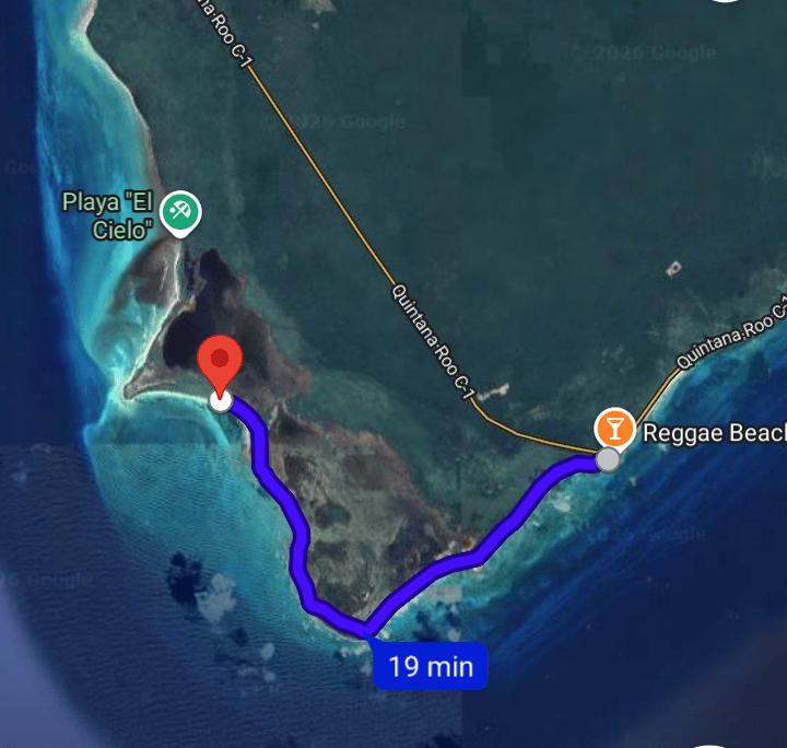 punta-sur-reef-cozumel-driving-directions – Jet Ski Cozumel Satellite map showing a 19‑minute driving route (blue line) along a coastal trail from Reggae Beach to a red pin near Punta Sur Reef on a small island as driving ng directions